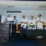 Picture from the inauguration ceremony revealing the brochure the inauguration ceremony